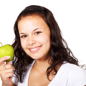 Apple in girl's hand PNG